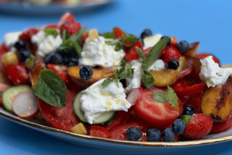 Summer panzanella with burrata and berries